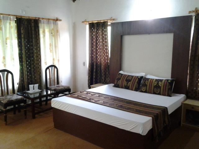 Hotel Arsh International Naini Tāl Quarto foto